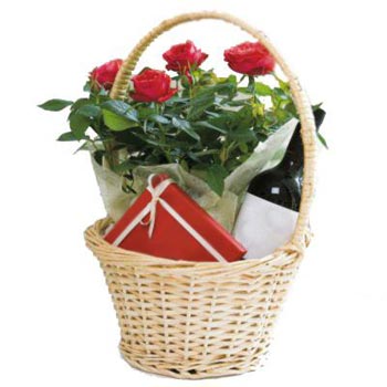 Basket with red roses, chocolates and wine - view more