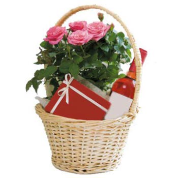 Pink roses, chocolates in basket